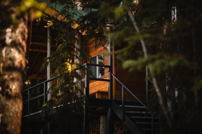 Eagle Cabin in the trees at Eagle's Nest Resort, Anahim Lake.