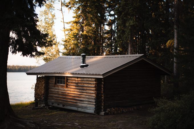A heritage cabin at the water's edge at Eagle's Nest Resort.
